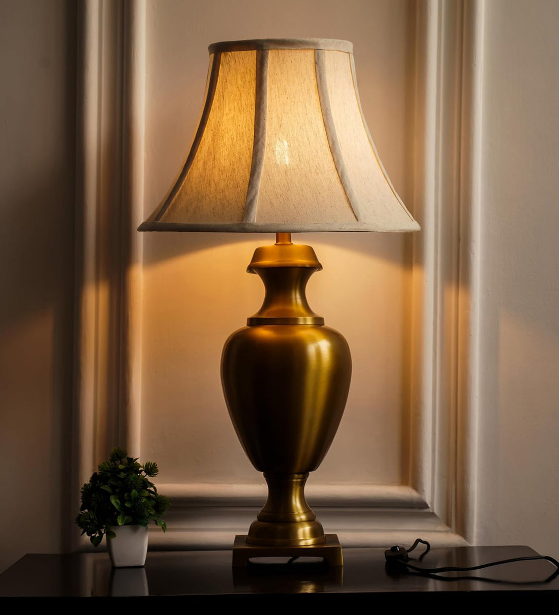 Royal Brass Antique Gold Finish Trophy Table Lamp 27 Inches Height With Off White Bell 14 Inches Diameter Lampshade